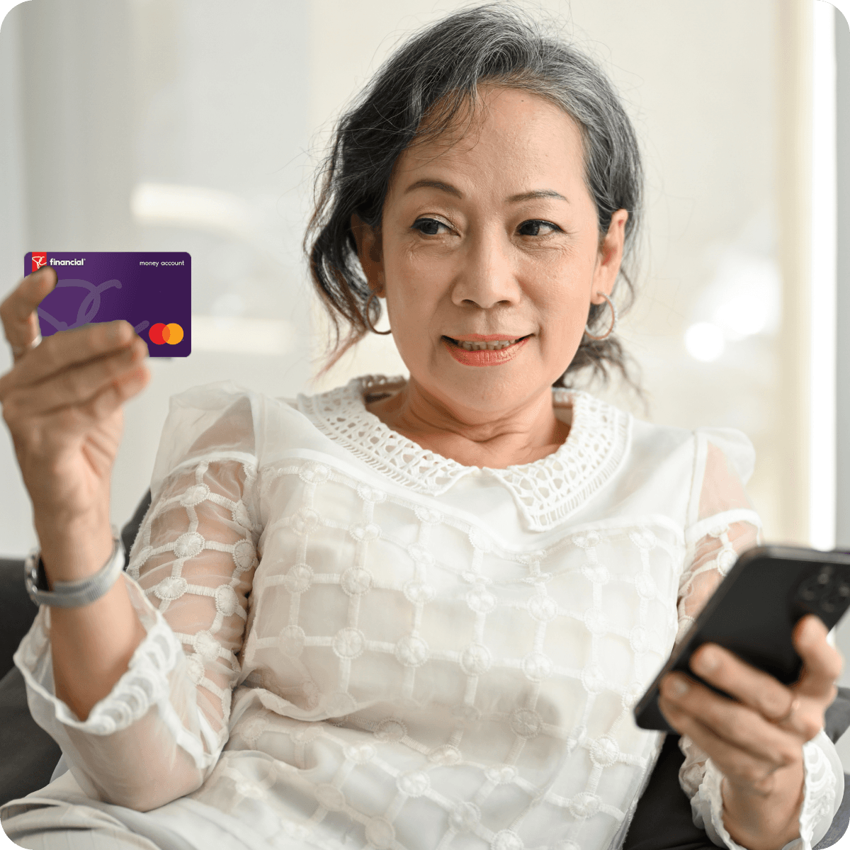 Woman looking at PC Financial Card