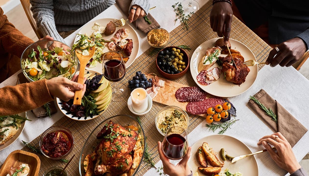 A table full of people sharing a holiday feast.